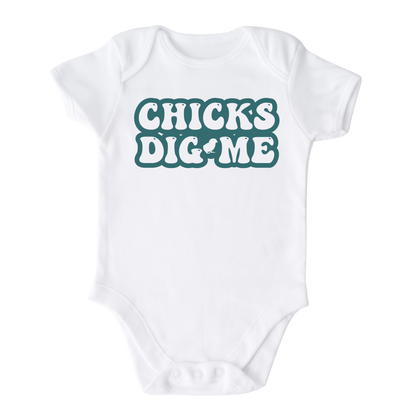 White Onesie featuring a cute and eye-catching printed graphic of bold green text saying 'Chicks Dig Me.' Embrace your child's charm and confidence with this playful tee.