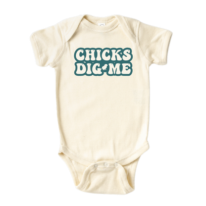 Natural Bodysuit featuring a cute and eye-catching printed graphic of bold green text saying 'Chicks Dig Me.' Embrace your child's charm and confidence with this playful tee.