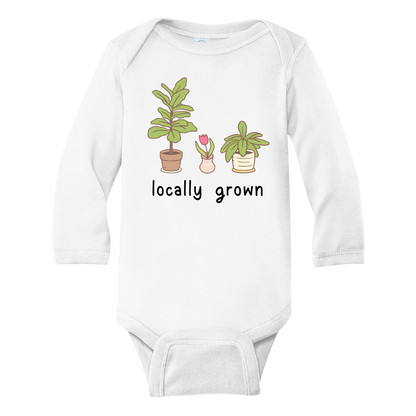 Long Sleeve White Onesie with a succulent graphic and the text 'Locally Grown.' This design represents local pride and supports community spirit.