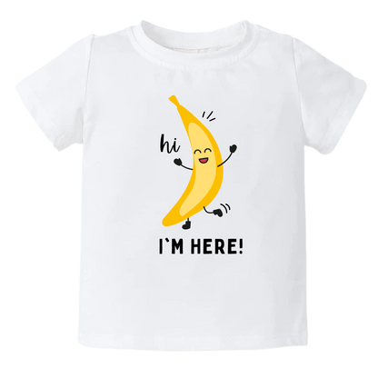 White Kids t-shirt with adorable banana graphic and 'Hi, I'm Here' text. Stylish and comfortable shirt for kids' fashion