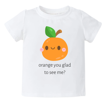 A kids' t-shirt with a charming graphic of a cute orange and the text 'Orange You Glad To See Me.' The design exudes a playful and lighthearted vibe, encouraging positivity and cheerful interactions. It's a delightful and expressive tee that brings joy to those who see it.