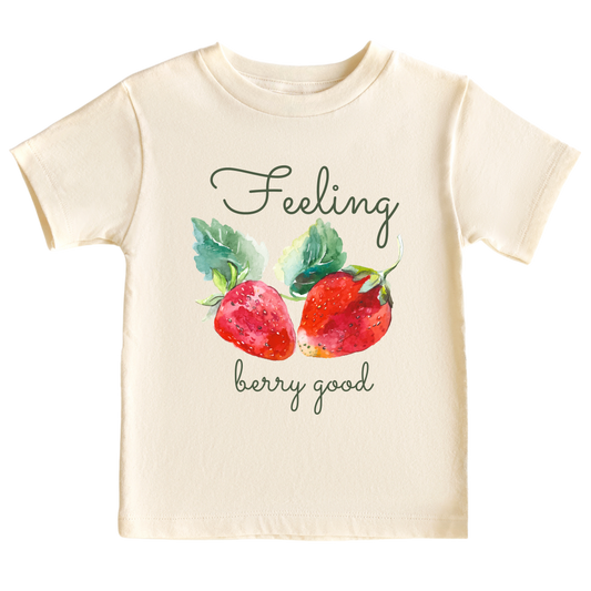 Natural Kid Shirt featuring a cute strawberry graphic and the text 'Berry Good.' Add a playful charm to your child's style with this delightful tee