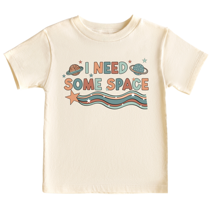 Natural Kids t-shirt with cute space graphic and the text 'I Need Some Space.' Perfect for space enthusiasts and young explorers.