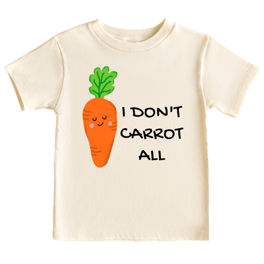 Kids t-shirt with carrot graphic and 'I Don't Carrot All' text. Playful and trendy shirt for children's fashion