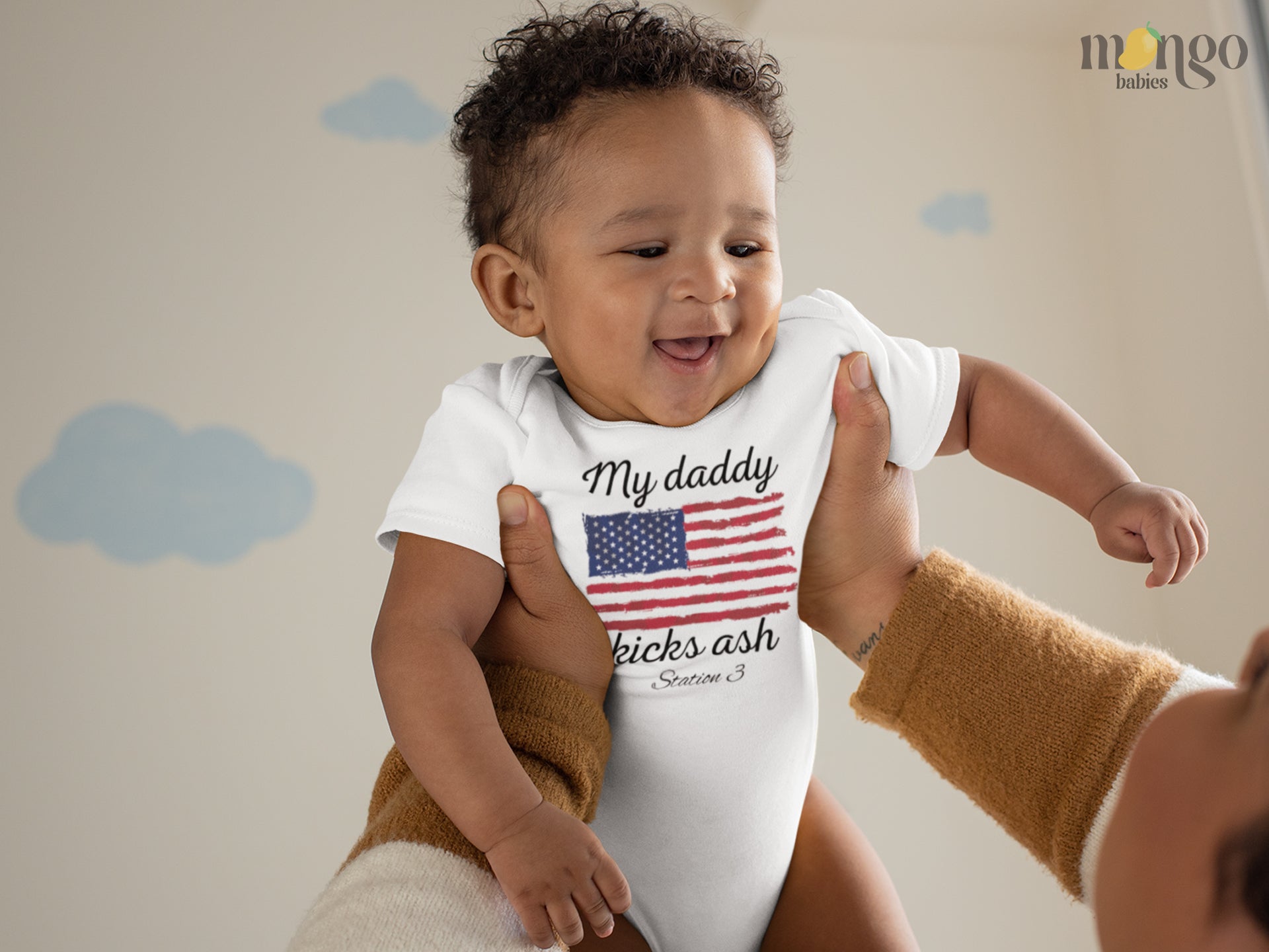 Onesie with a cute printed design of American flag theme, customizable with the text 'My Daddy Kicks Assh'.