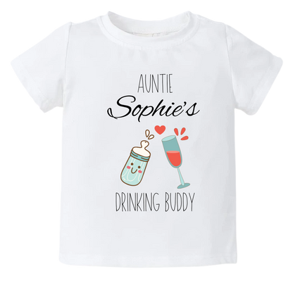 Kid's t-shirt with a cute printed design of a wine glass and a milk bottle, customizable with the text 'Aunt's Drinking Buddy'.