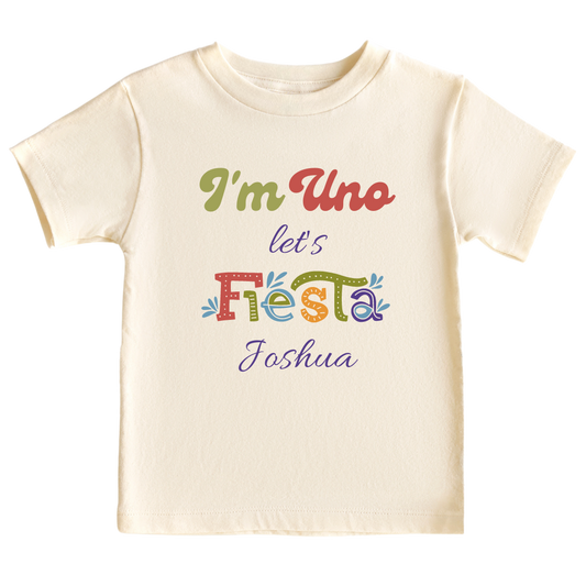 Kid's t-shirt with a cute 'I'm Uno Let's Fiesta' design, customizable for personalization.