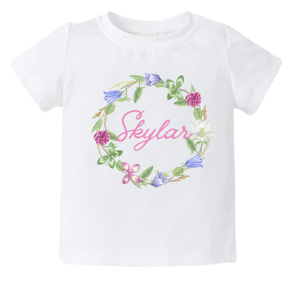 Kid's t-shirt with a cute floral wreath design, customizable with names.